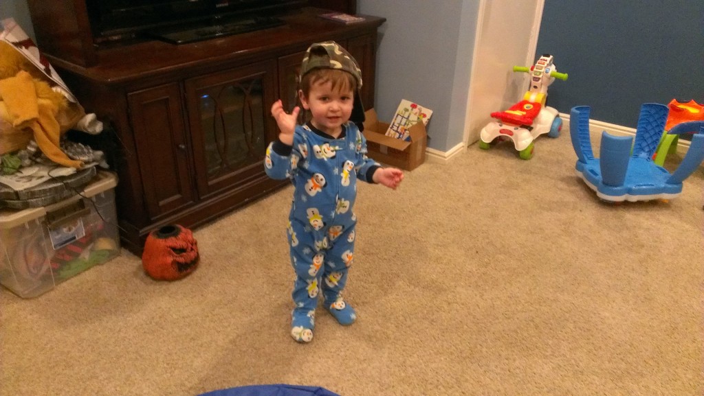 Nathan tries on a hat